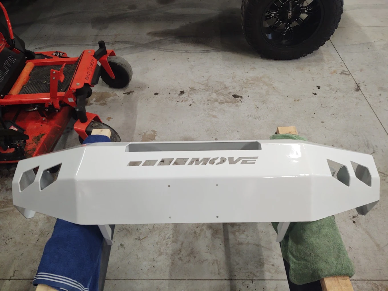 Off-road truck bumper powder-coated in gloss white